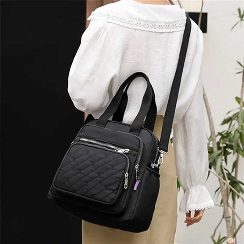 2023 New Bag Women's Backpack USB Mobile Charging Multi Purpose Women's One Shoulder and Two Shoulder Mommy Travel Bag