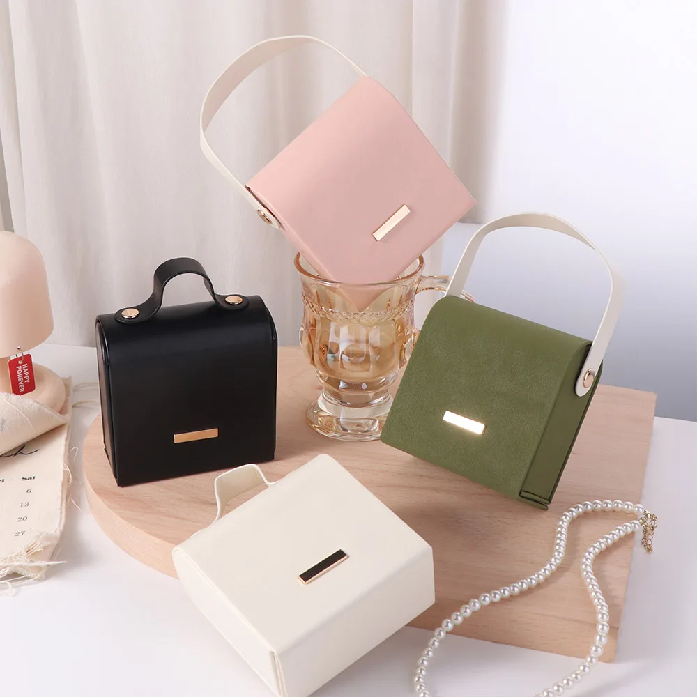 

Hand-Held Jewelry Packing Bag Handbag Appearance PU Leather Earrings Storage Case Rings Necklace Organizer Jewelry Display Box