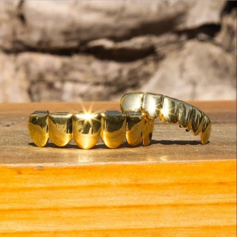 Juego de dientes de Hip Hop chapados en oro y plata, parrillas extraíbles de fondo superior, diseño de vampiro alto fijo de silicona, joyería de moda, regalo de cumpleaños