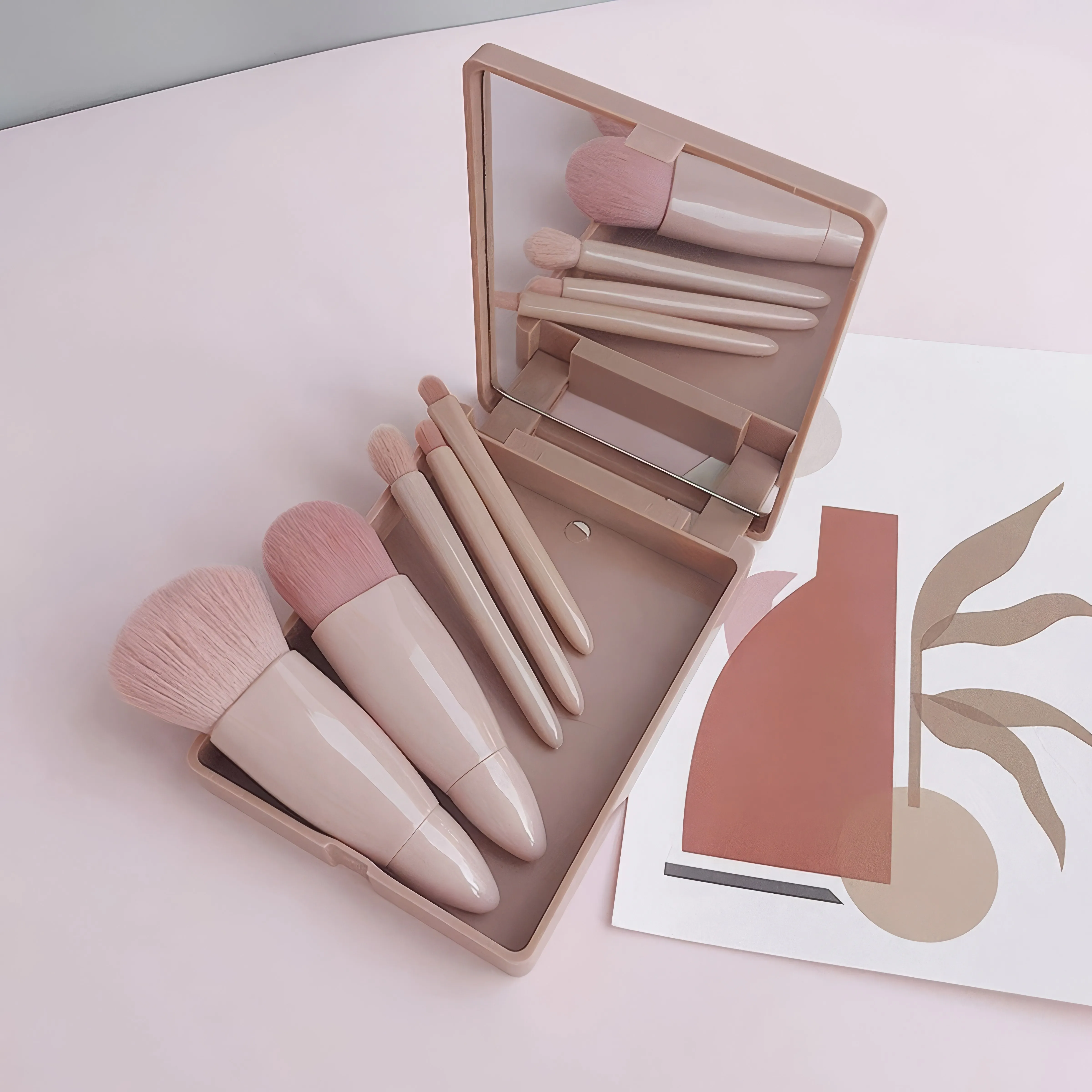 Juego de brochas de maquillaje rosa con estuche de espejo, cerdas suaves para un maquillaje impecable de rostro y ojos.
