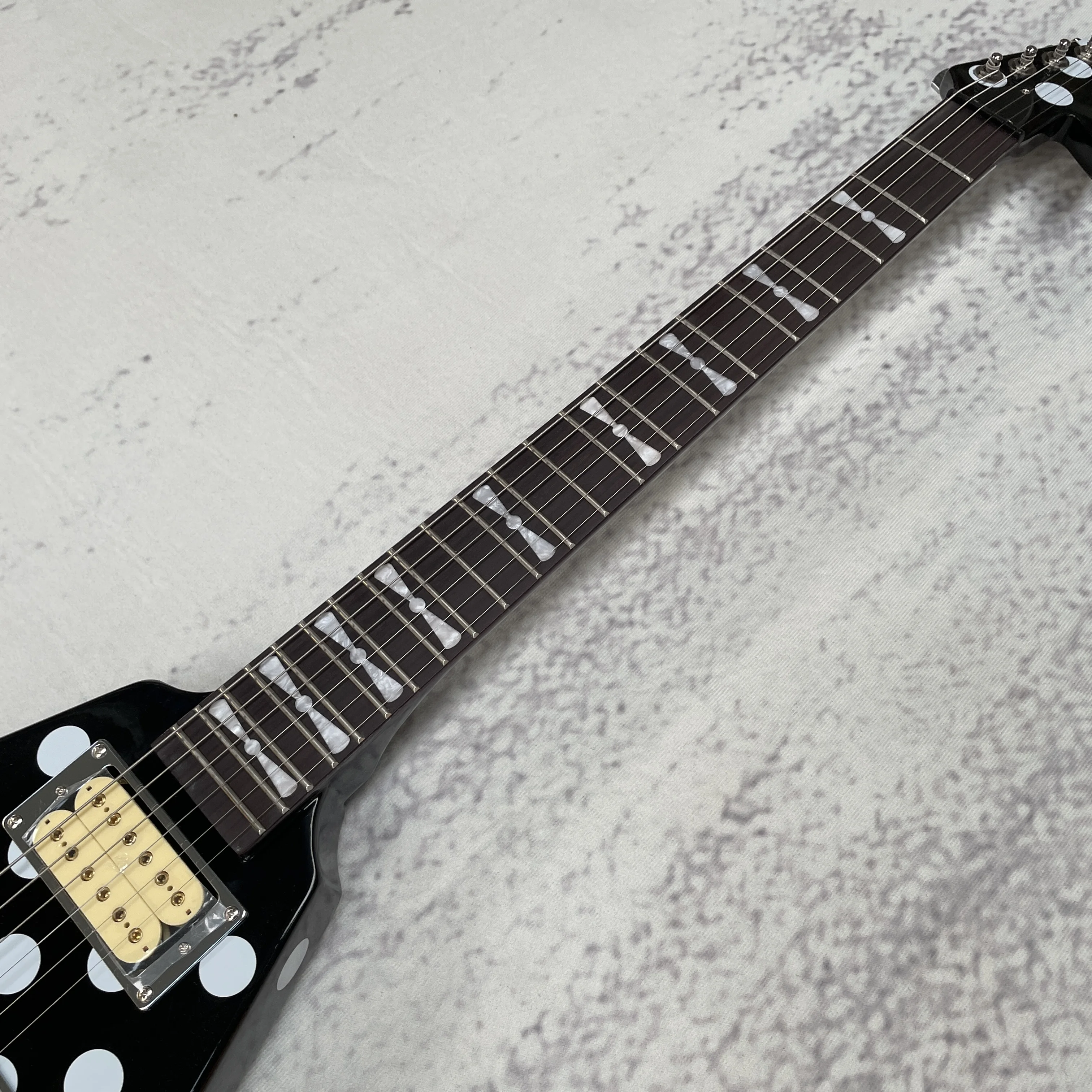V Shape Electric Guitar, Black with White Polka Dots, Dual Gold Closed Humbuckers, Chrome Tremolo, Block Inlays, 22 Frets