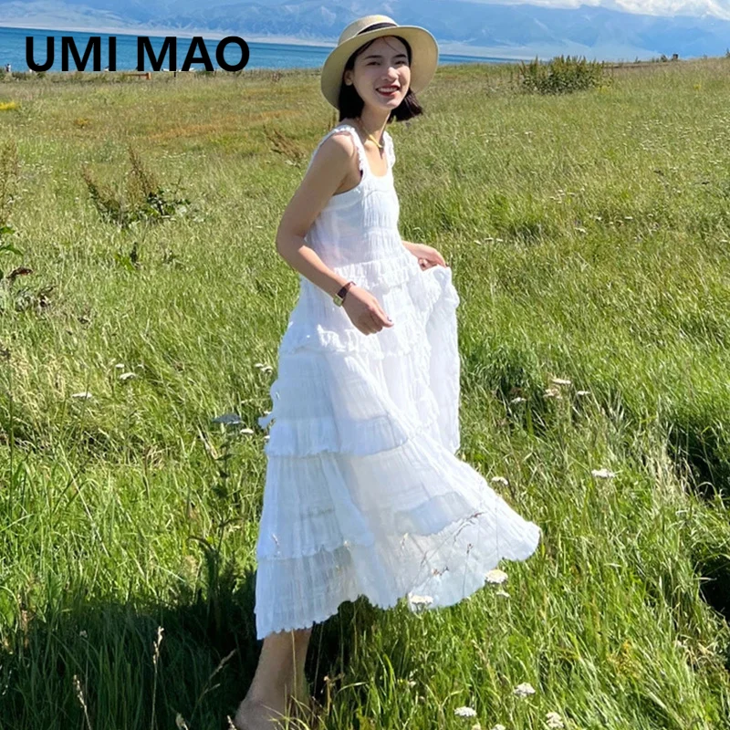 UMI MAO Exquisite Milk Fufu White Sling Dress 2024 New Summer Beach Vacation Style Fairy Long Dress With High Grade Feeling