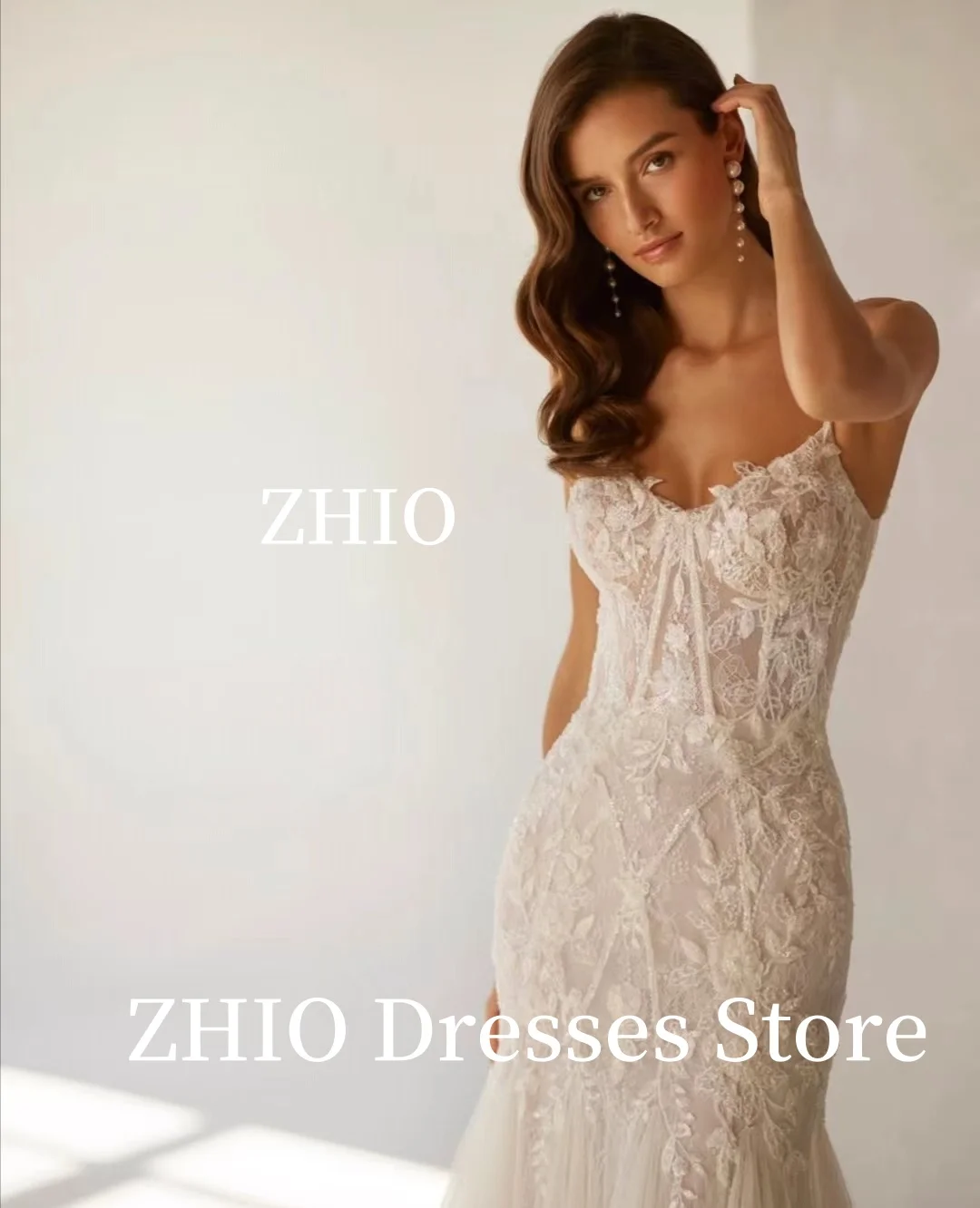 ZHIO หรูหรา Applique ชุดเดรสเมอร์เมดสปาเก็ตตี้ Tulle Ivory Sweep Train อย่างเป็นทางการชุดราตรีชุดเจ้าสาวปรับแต่ง