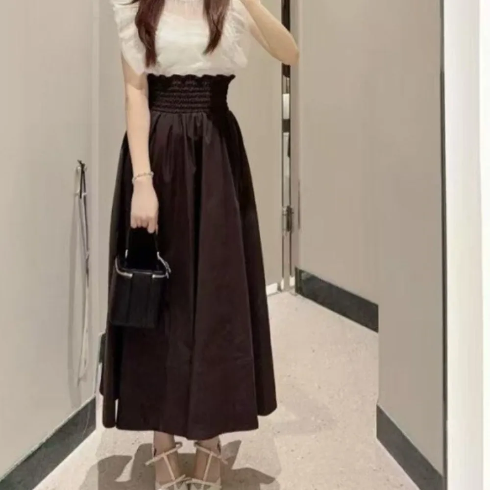 Elegancka spódnica midi w stylu japońskim, luksusowa, uniwersalna, z dużym zamachem, dla kobiet pracujących w biurze, miękka, premium, modna.