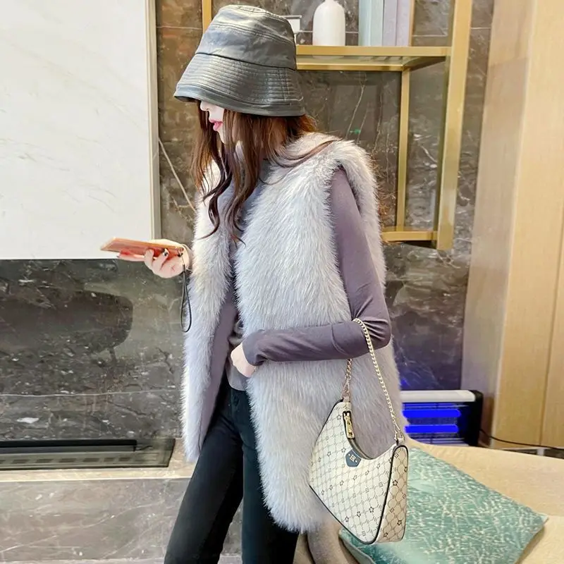 Outono inverno nova moda feminina elegante luxo casual na moda sem mangas cor sólida coletes de pele do falso casacos femininos roupas topos