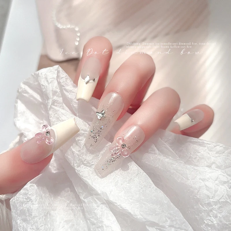 10 sztuk punkt diamentowa wstążka zawieszki do paznokci 10*8mm przezroczysta kokarda biżuteria artystyczna do paznokci dekoracje 3D letnie akcesoria do Manicure