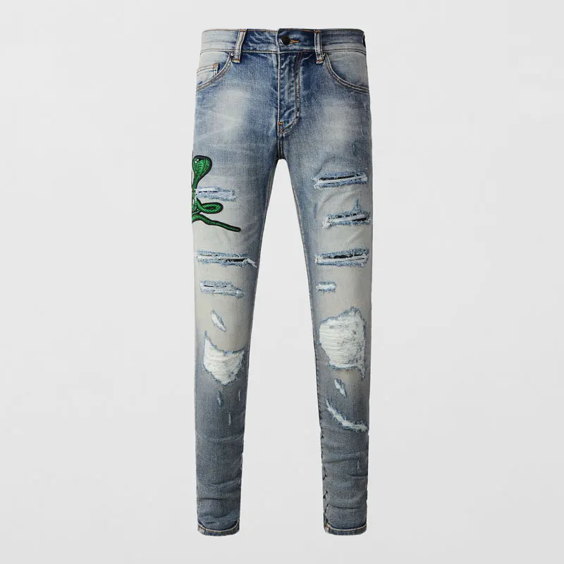 

Fashionable new men's jeans, washed with water, nostalgic distressed patch, snake shaped pattern, light blue jeans, high street