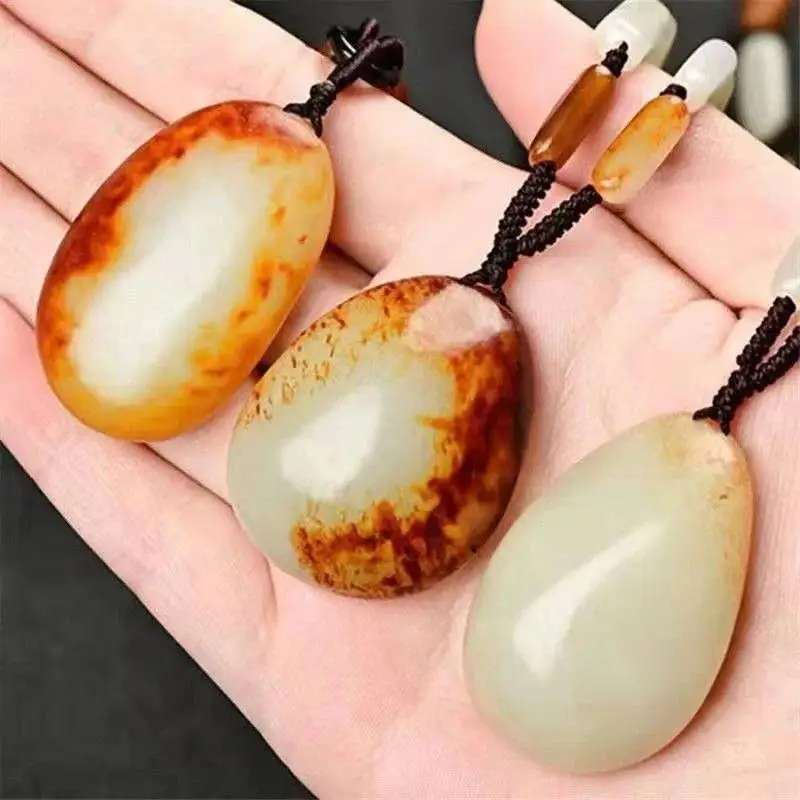 Xinjiang Hotan white with a maroon skin red-toned freeform sweater chain jade pendant