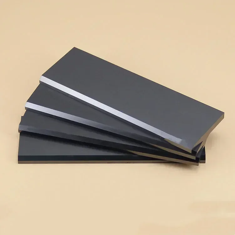 A piece of graphite,carbon sheet, vacuum pump,carbon sheet, air pump blade, printing machine, carbon sheet, vacuum machine blade