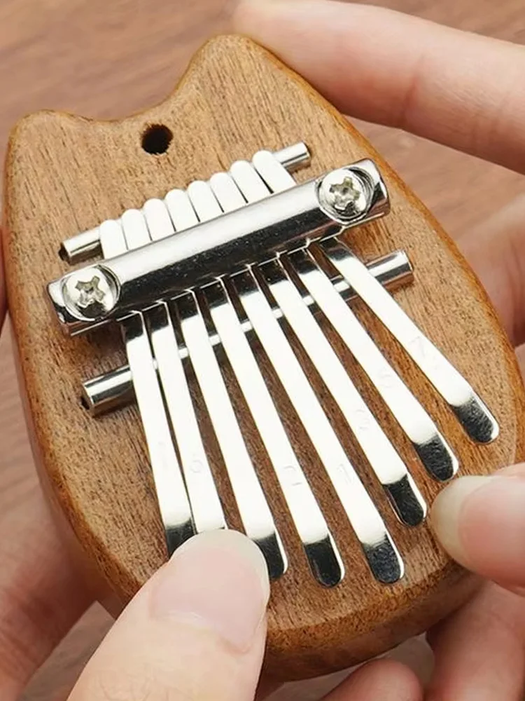Miwayer 8-klawiszowa Mini Kalimba Pianino Palcowe - Przenośne Kieszonkowe Pianino Palcowe z Breloczkiem / Prezent Muzyczny dla Początkujących — zdjęcie 2