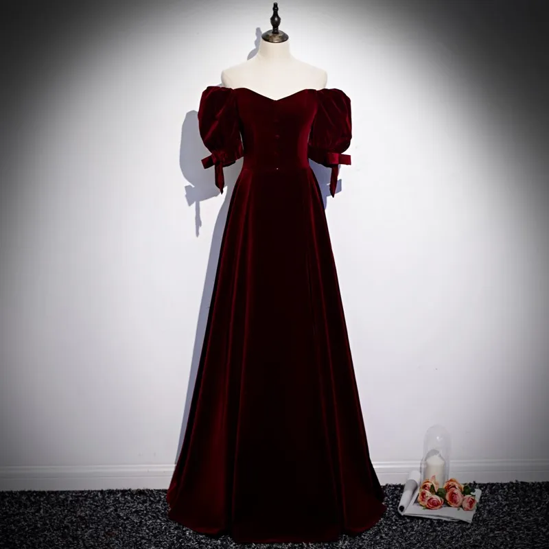 

A toast to the new Burgundy velvet one-shoulder dress