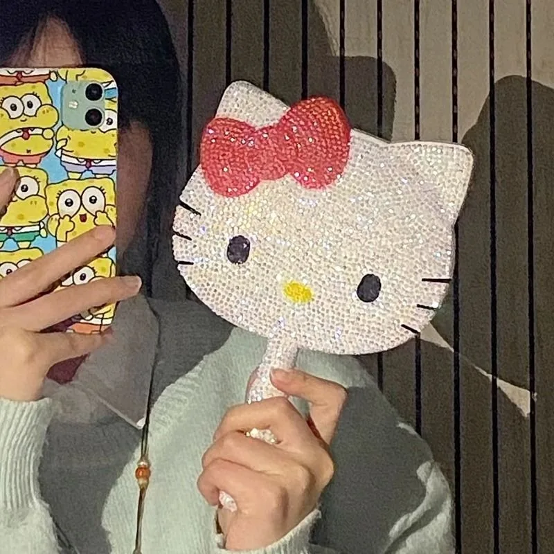 

New Hello Kitty Peripheral Cartoon Creative Handle Mirror Kawaii Fashion Simple Dormitory Portable Handheld Cosmetic Mirror