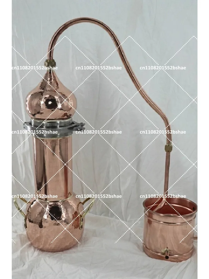 Copper still for home use; small, ancient distillation device with 2 liters; water pump and pipe included.