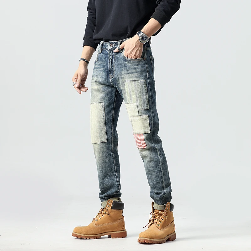 Fashionable patchwork irregular patchwork design jeans for men's slim fit small straight leg elastic American trendy pants