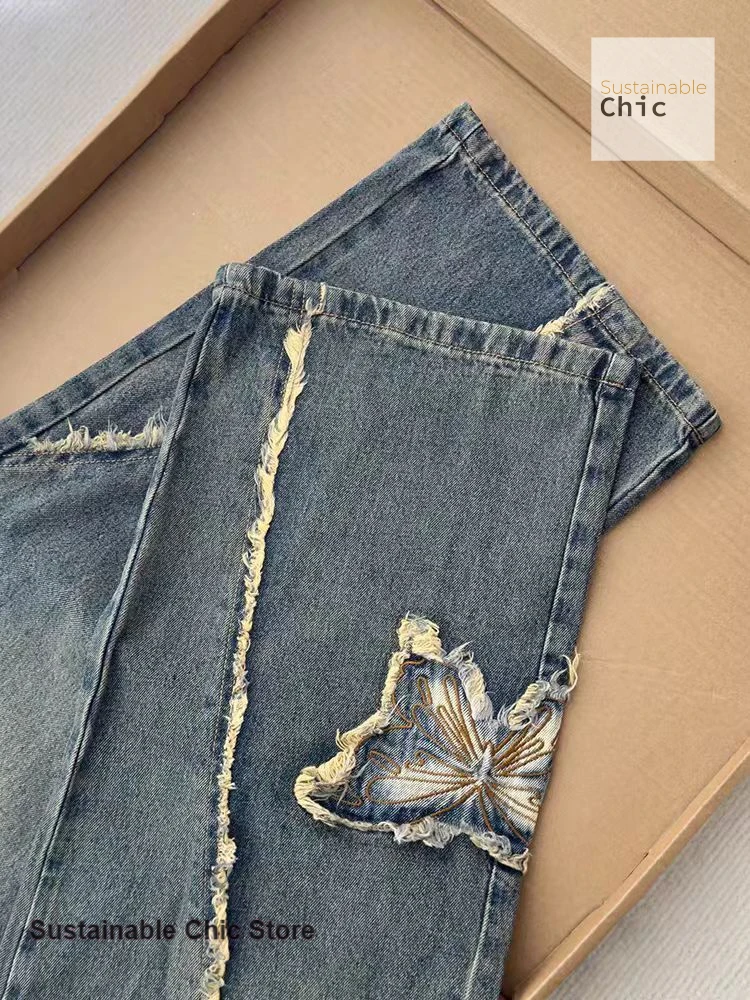 Pantalones vaqueros de pierna ancha bordados con lazo crudo retro americano para mujer Otoño e Invierno nueva moda Spice Girl pantalones de encaje de calle alta.