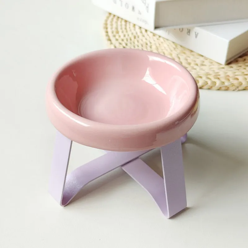 Neck-protecting elevated plastic food and water bowls , anti-chin-darkening flying-saucer-shaped pet feeding bowls