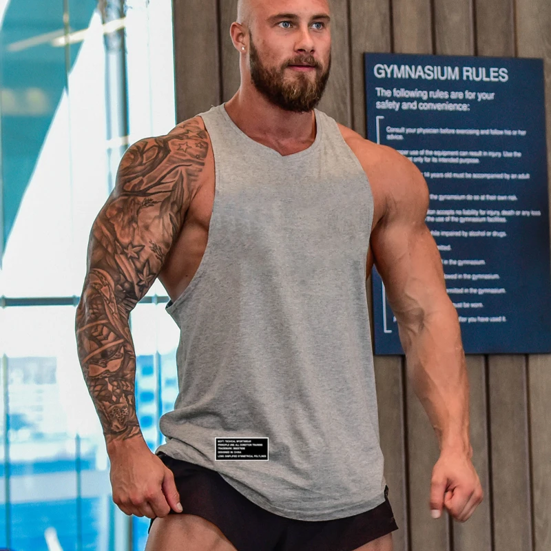 Najnowsza luźna męska kamizelka sportowa do biegania bawełniana oddychająca koszulka treningowa siłownia kulturystyka Fitness bez rękawów podkoszulki treningowe