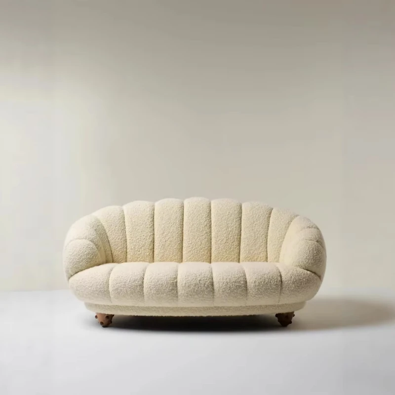 

Two ivory upholstered bean bag sofas, fluffy and comfortable, rectangular floor-to-ceiling sofas