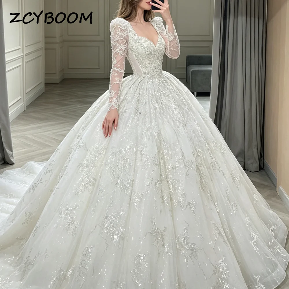 Customized Luxury Sweetheart Long Sleeves Ball Gown Wedding Dress Sequined Sparkly Appliques 2026 Bridal Gown With Sweep Train