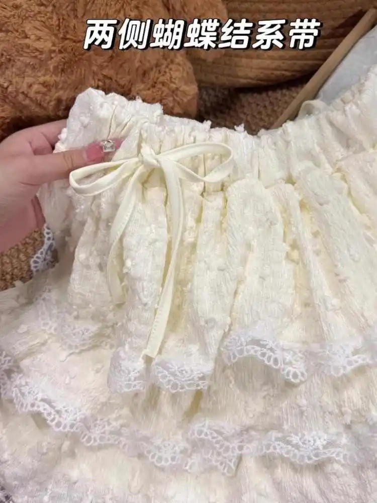 กระโปรงทรงเอไลน์สั้นแต่งผ้าลูกไม้สีแอพริคอตประดับโบว์สไตล์วินเทจ Y2k Gyaru สไตล์ฮาราจูกุ  สำหรับผู้หญิง  คอลเลคชั่น Cutecore  ฤดูร้อน  ปี 2000