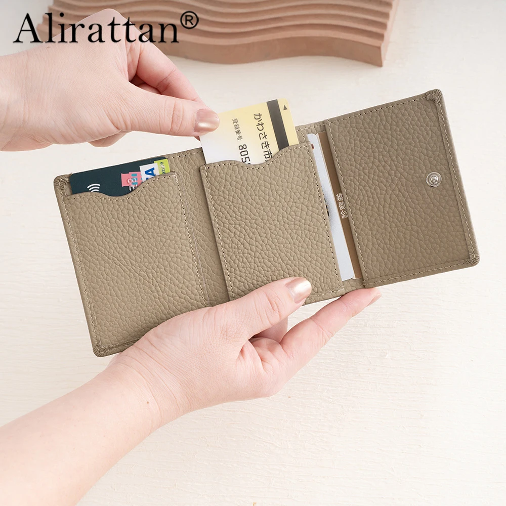 Alirattan 2026 New Genuine Leather Lychee Pattern Three Fold Women's Short Wallet Loose Change Anti-Theft Brush