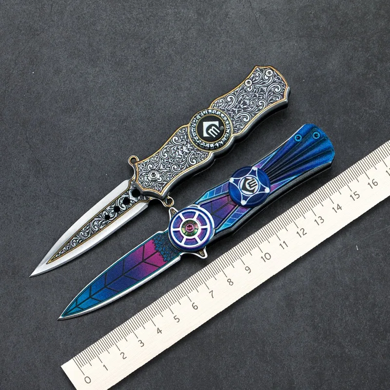 

Mini Self Defense Folding knife High Hardness Wear-resisting Pocket knives Fingertip Gyroscope can Rotate Portable Camping Knife