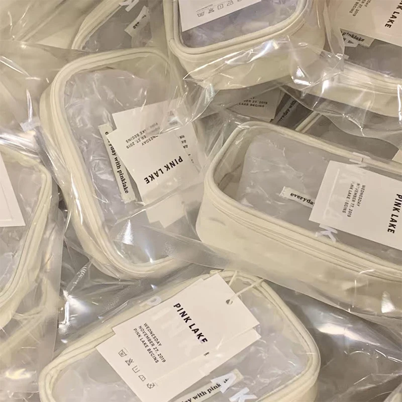 Compact and Transparent Beige Pencil Pouch, Ideal for Student's Stationery and Scrapbook Storage Needs