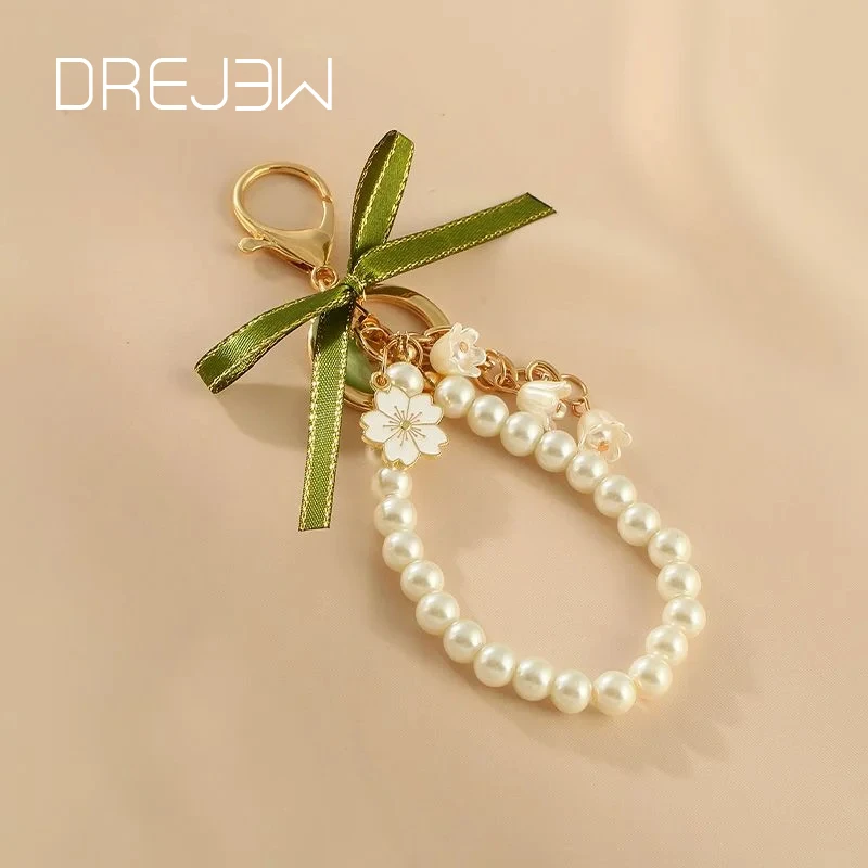 DREJEW 2025 llavero de cuero con flor de lirio del valle para mujer, llaveros dulces de moda de Corea, accesorios Fairycore verdes