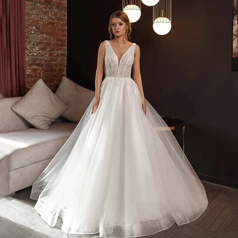 

Sexy V-neck Sleeveless Classical Puff Backless Mopping The Floor Wedding Dresses A-Line Beach Gorgeous Princess Bridal Gowns