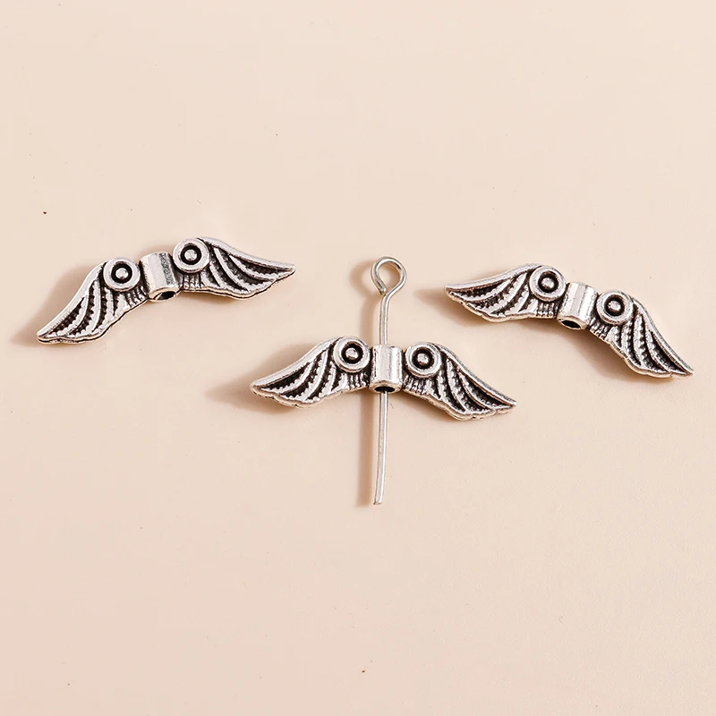 Leslie 40 Stück 7 x 23 mm Vintage Federflügel Charms Perlen für Anhänger Halsketten handgefertigte Armbänder Schmuckherstellung Zubehör – Detail 3