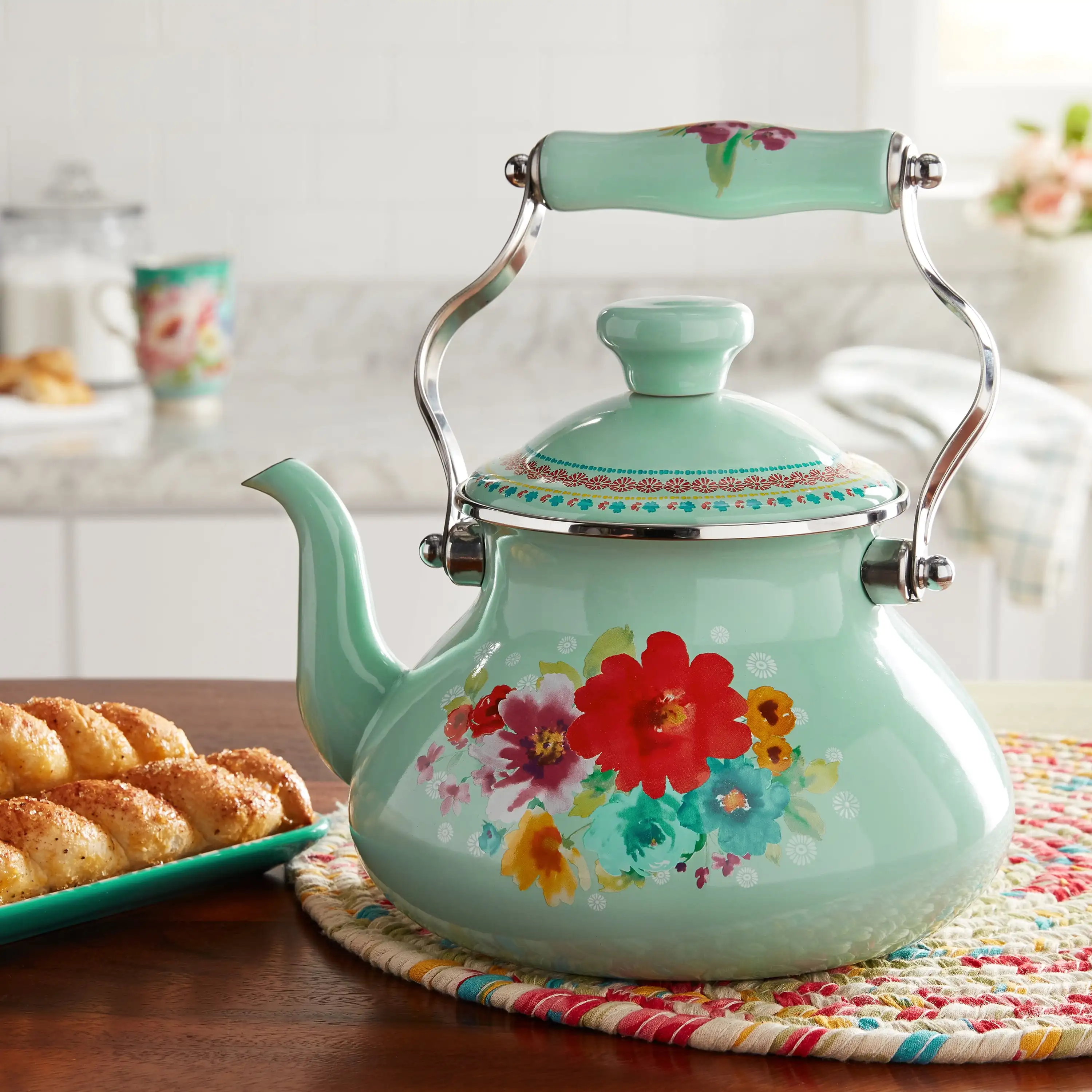 

Enamel On Steel 1.9-Quart Tea Kettle-Classic folding handle resists heat for a safer grip