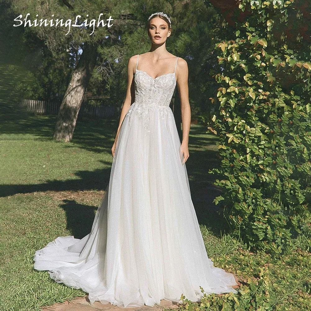 

ShiningLight Spaghetti Straps A-Line Wedding Dress Applique Tulle Boho Beach Bridal Gown Backless Vestido De Noiva Customized