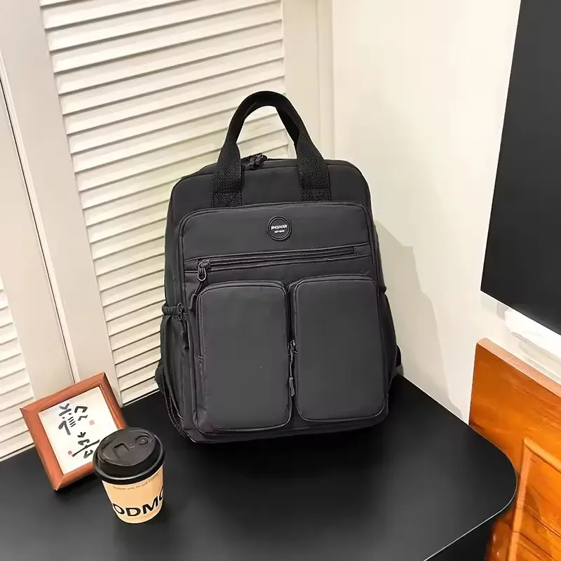 

New casual and fashionable waterproof nylon schoolbag, versatile backpack, multi-functional large-capacity backpack for college