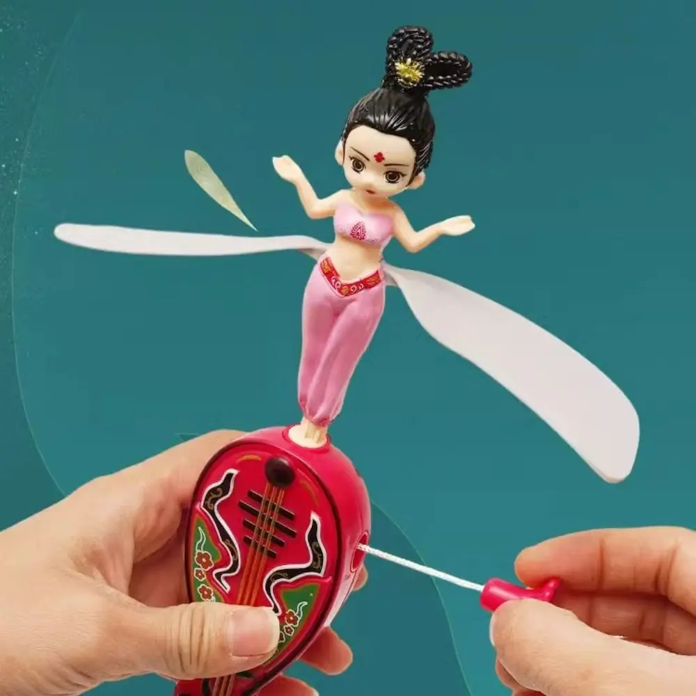 Dançarinos criativos bonecas voadoras disco fada spinner dos desenhos animados fada flyer disco voador pp pipa puxar corda para meninos