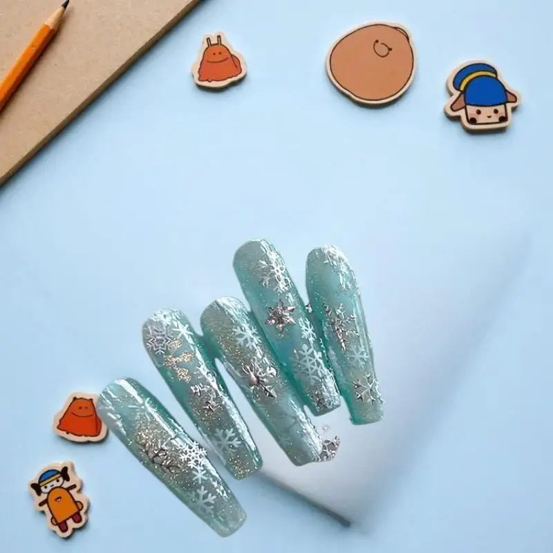 

Holiday Inspired Cartoon Christmas Nail Stickers, Sparkly Gold/Silver Snowflakes Manicure Decals for DIY Decoration