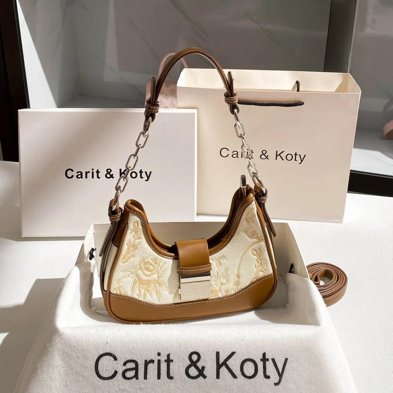 

New Chinese-style heavy embroidery baguette bag with a high-end feel and contrasting colors, suitable for carrying under the arm