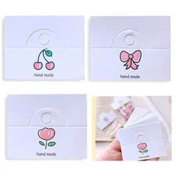 50 stücke Kirsche/Bogen Knoten/Blumenmuster hängende Karte 6,4x4cm faltbare Tag für Haarschmuck Verpackung Schmuck Einzelhandel Preis schild