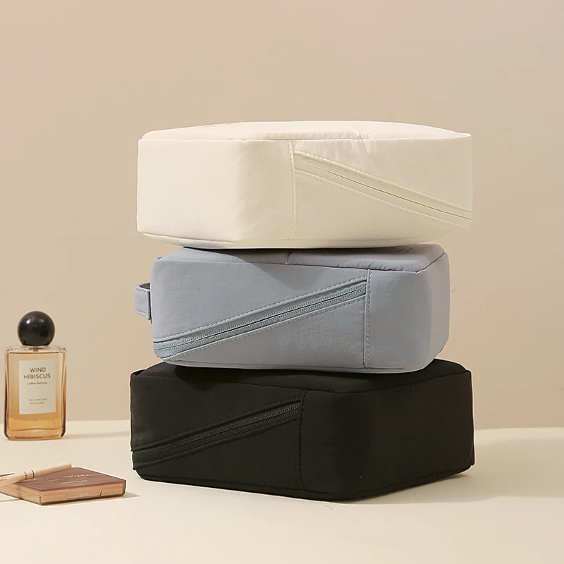 The Structured Taslan Makeup Bag Is a Travel Storage Essential for the Sophisticated Girl Made from Taslan Fabric, It Is Not Ea