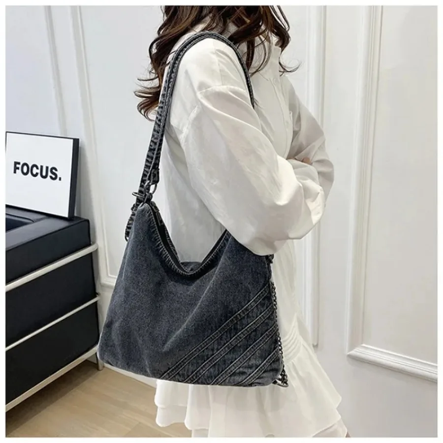 

Spring and summer new fashion large capacity cowboy handbag casual commuting armpit bag simple shoulder crossbody female bag