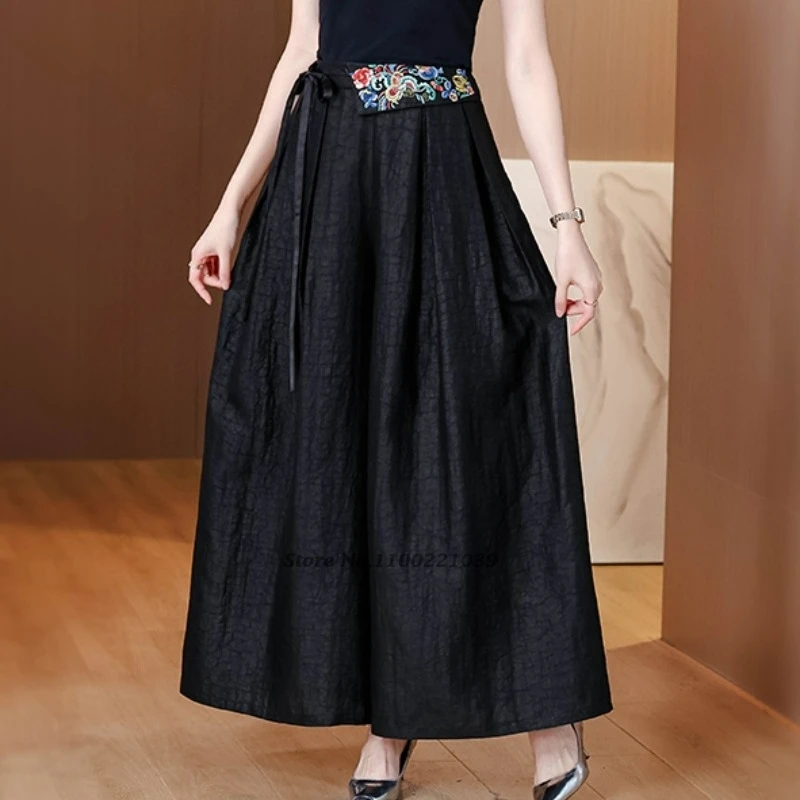 2025 السراويل الصينية خمر الرجعية الساتان السراويل الشعبية الوطنية زهرة التطريز السراويل العرقية مرونة الخصر واسعة الساق السراويل