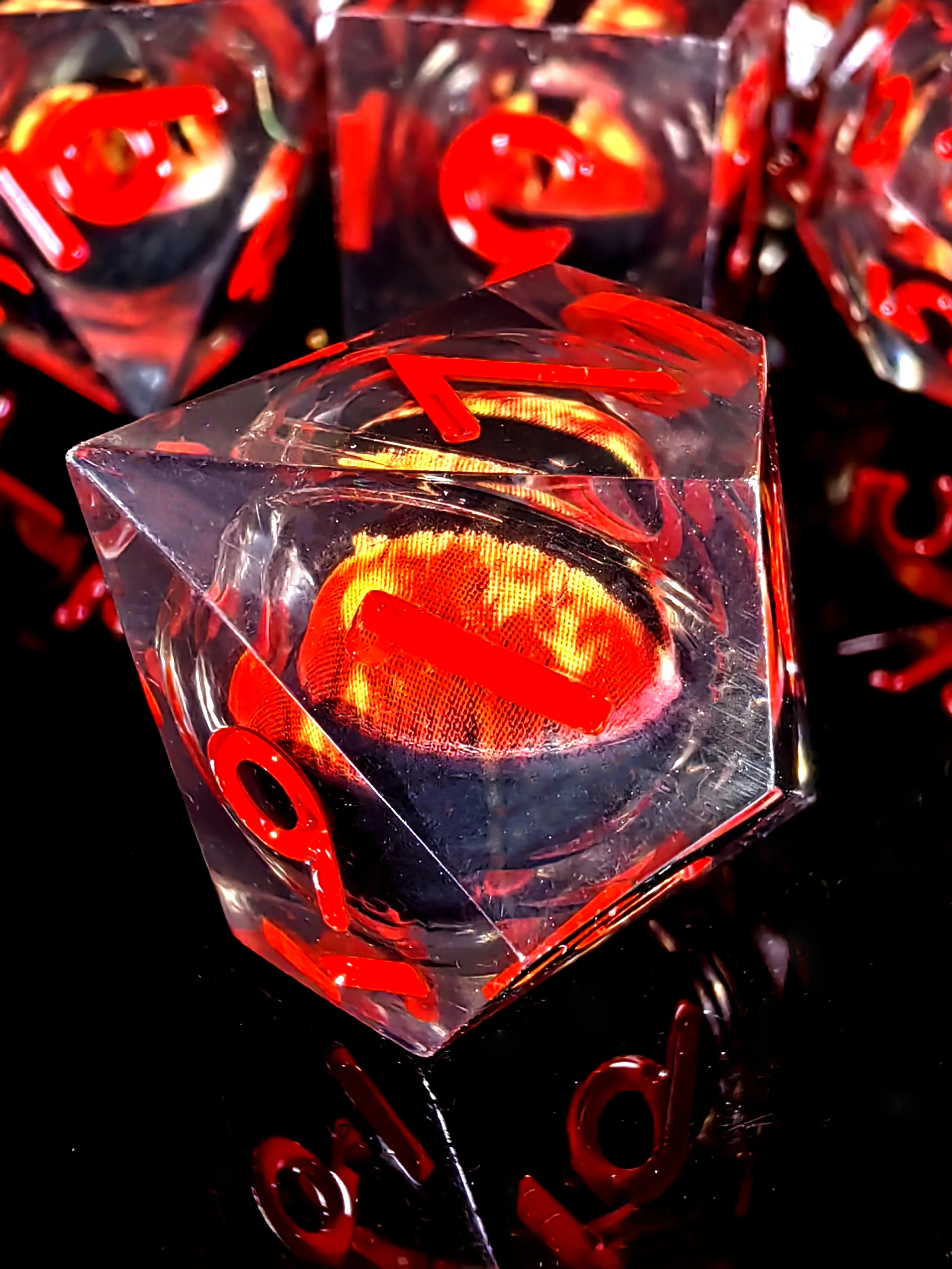 DnD Dice Set - 7-Piece Resin Dice with Spinning Dragon Eye Core, Transparent Base Red Lettering for Tabletop RPG and Board Games