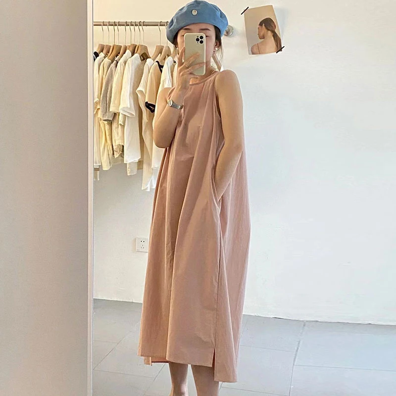 เสื้อกั๊กทรงหลวมสไตล์เกาหลีสีชมพูพาสเทล ดีไซน์เก๋ไก๋ พร้อมกระโปรงทรงเอ สไตล์ลำลอง ผ่าข้าง เหมาะสำหรับฤดูร้อน