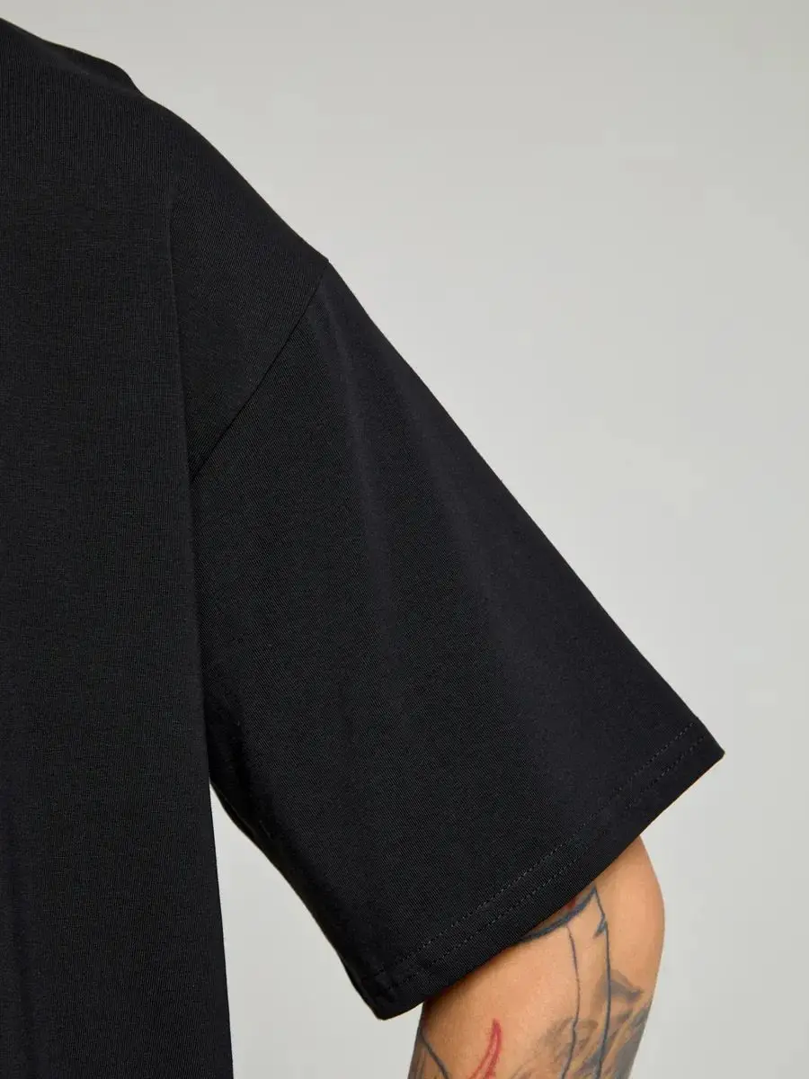 تي شيرت نسائي أسود هاي ستريت - 100% قطن عضوي فضفاض مزين بالزهور