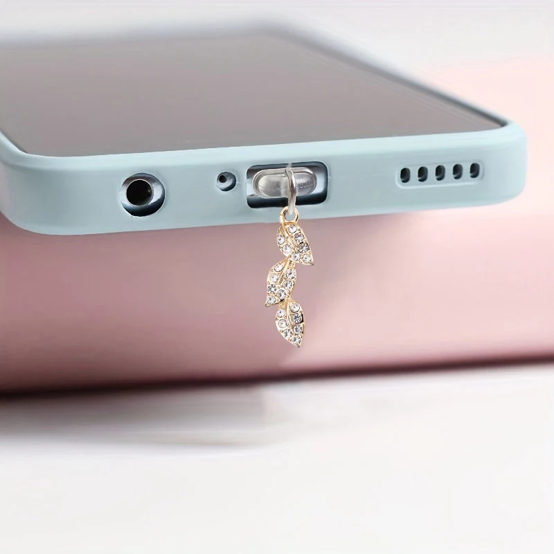 Mobile phone dust plug inlaid with diamond leaves fashionable and beautiful alloy pendant jewelry dust plug