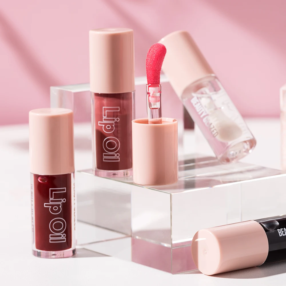 rystal Jelly Lip Oil - ลิปบาล์มให้ความชุ่มชื้นและอวบอิ่มพร้อมพื้นผิวมัน ผสมกับสควาเลนจากพืช เหมาะสําหรับนุ่มนวล