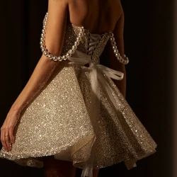 STEVDITG Glitter Champagne Sequin Cocktail Party Dresses Girls Sparkly Mini Skirt Pearls Spaghetti Straps Prom Dress for Women