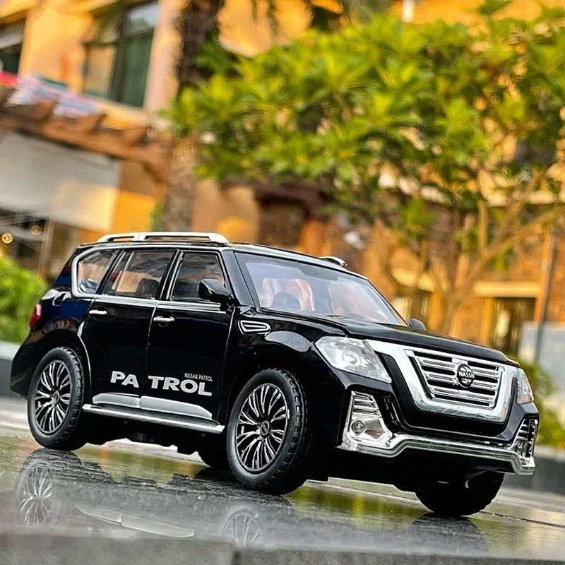 

1:24 Nissan Patrol Alloy Car Model Diecasts Metal Toy Modified Off-road Vehicles Model Simulation Sound Light Childrens Toy Gift