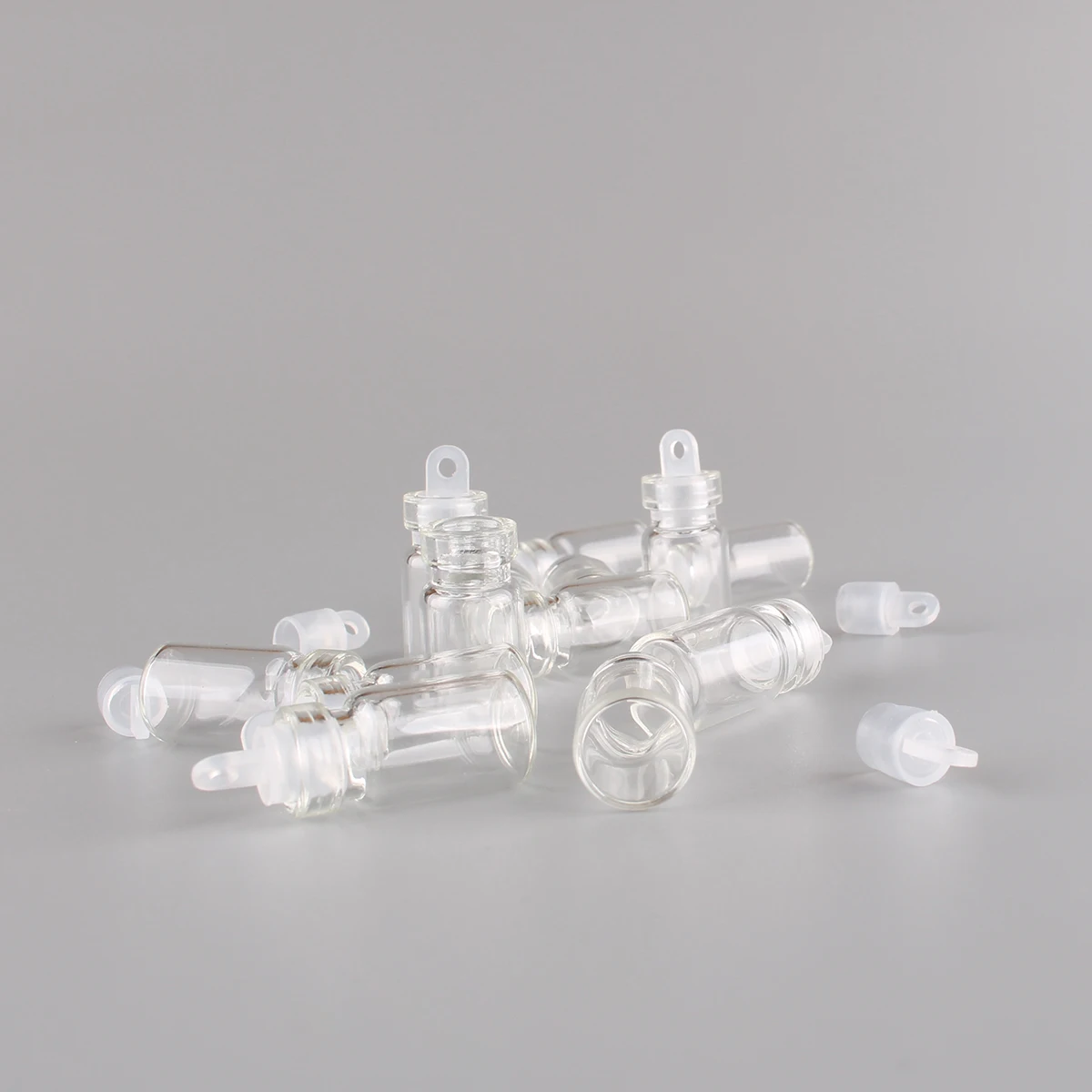 100pcs 11*22*6.5mm 1ml Mini Glass Wishing Bottles Tiny Jars Vials With Plastic Stopper