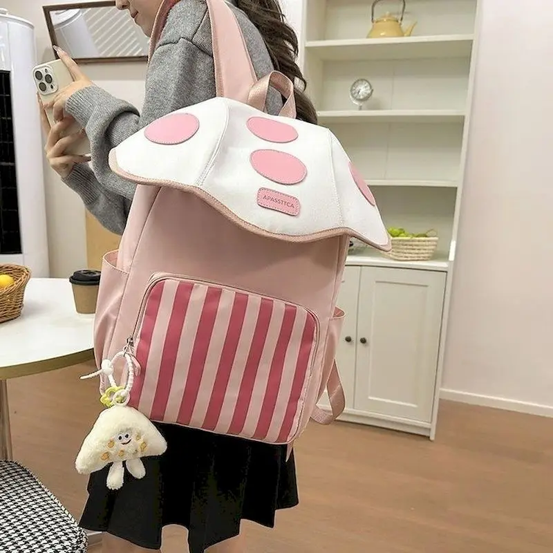 

Funny Backpacks Casual Ins Style Student Large Capacity Mushroom-Like Nylon Backpack For Men And Women 2026 New In Travel Bags
