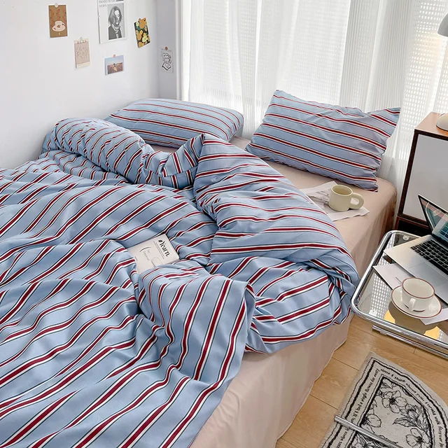 Simple Red and Blue Striped Duvet Cover and Four Piece Bed Sheet Set with Washed Cotton Bedding on the Bed 3